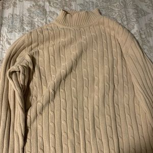 Tanish brown turtleneck sweater